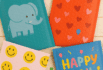 Colorful bubble mailers with elephant, heart, smiley face, and 
