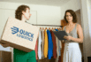 two people with a shipping box