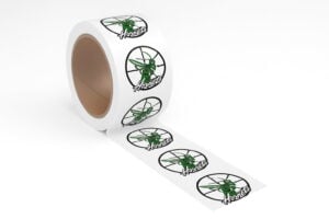 Roll of custom-printed tape featuring a green hornet logo in a circular design, with repeated branding on each segment of the tape.