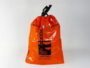 orange drawstring retail plastic bag